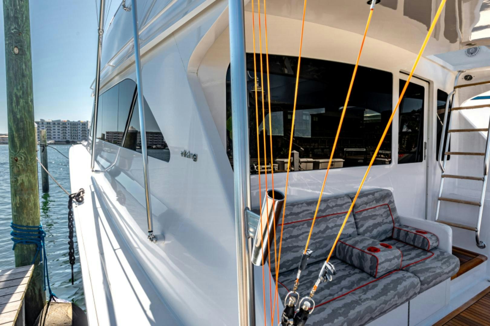 a boat with a canopy aboard MISS PAULA V Yacht for Sale