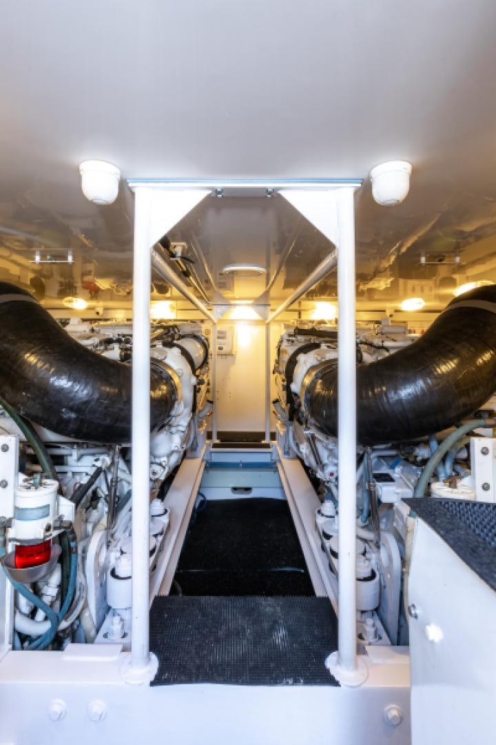 a room with a large mirror aboard MISS PAULA V Yacht for Sale