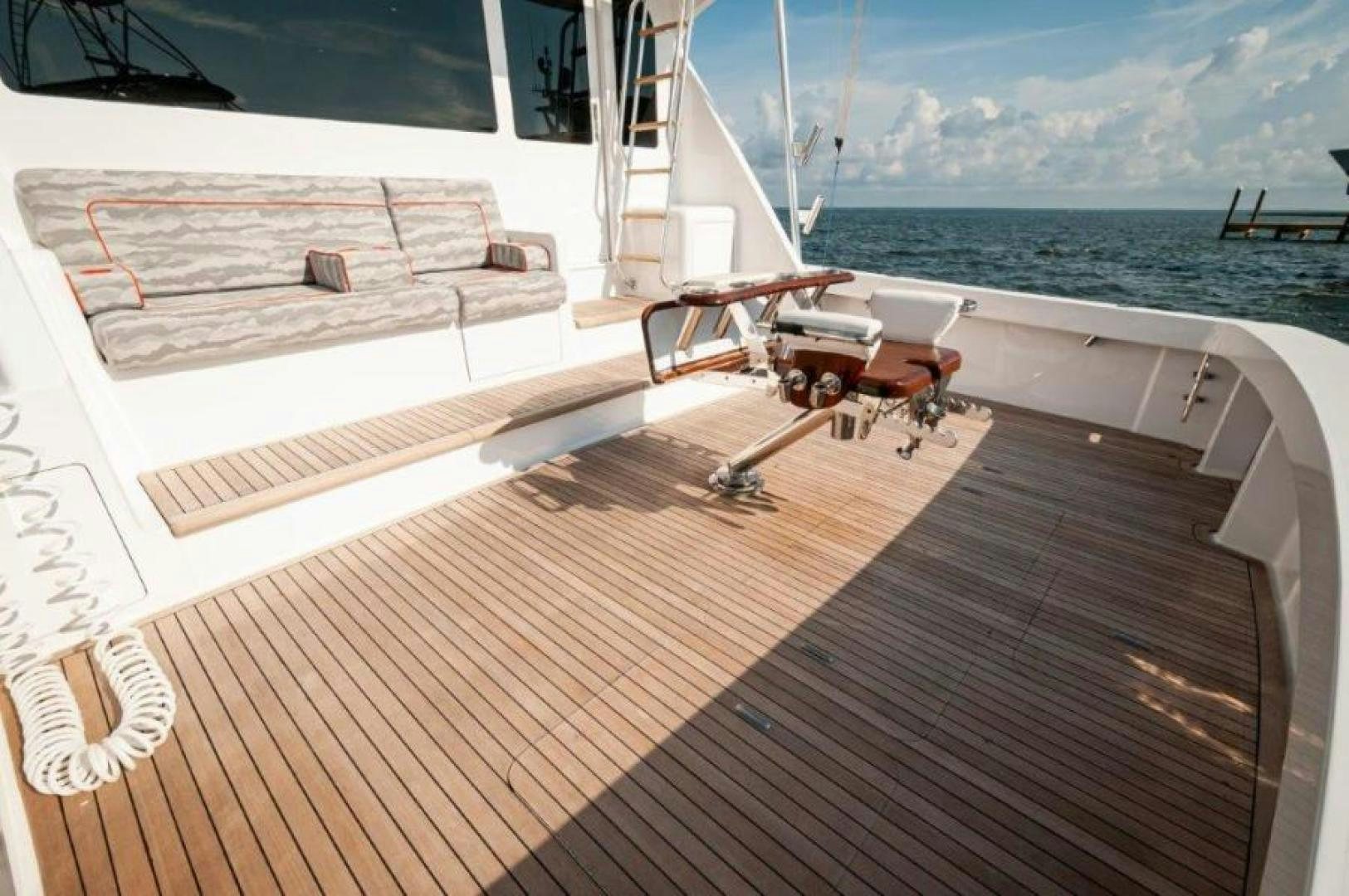 a deck with a boat on it aboard MISS PAULA V Yacht for Sale