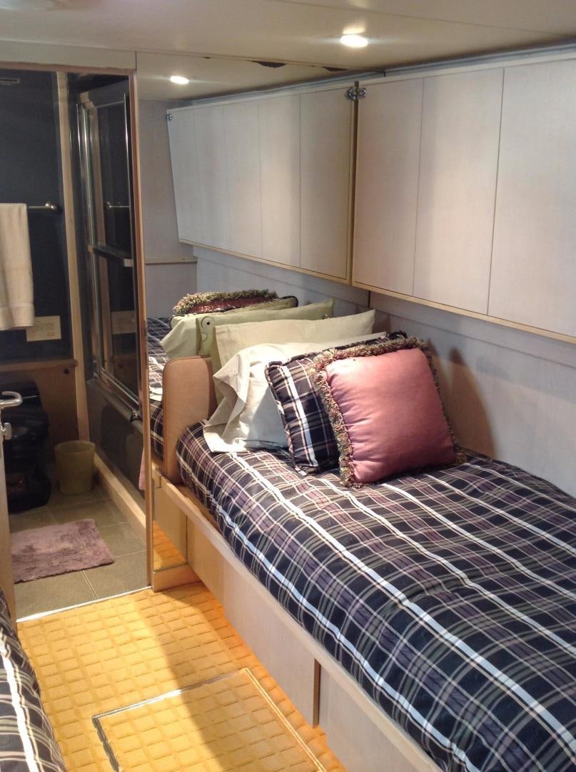 a bed with pillows aboard AUDACITY Yacht for Sale