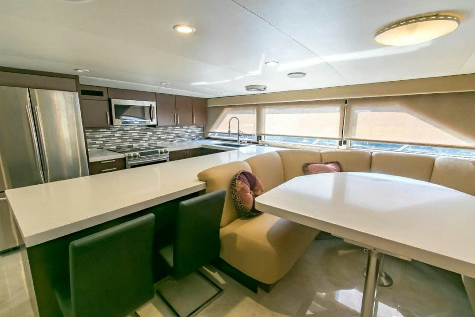 a kitchen and living room aboard AUDACITY Yacht for Sale