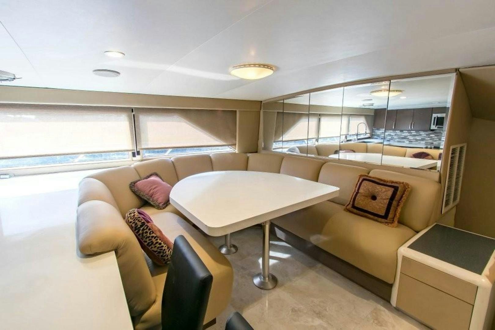 a living room with a couch and a table aboard AUDACITY Yacht for Sale