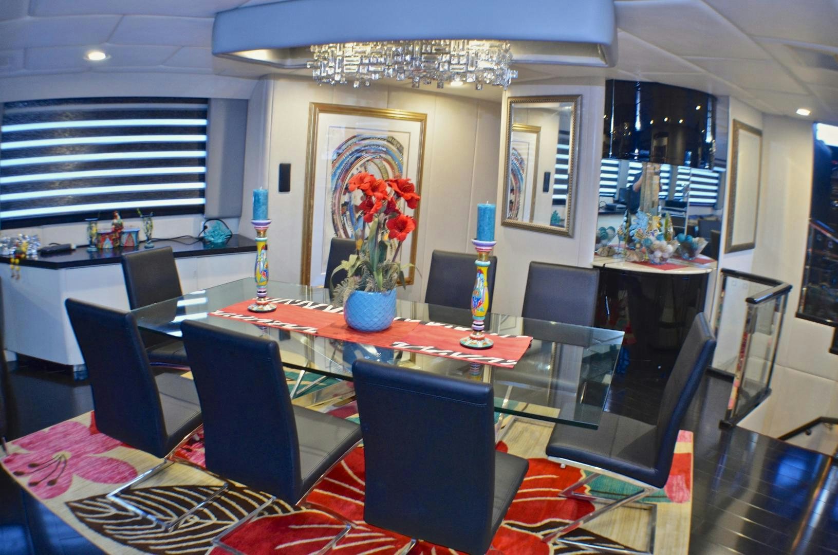 a large room with a table and chairs aboard AUDACITY Yacht for Sale