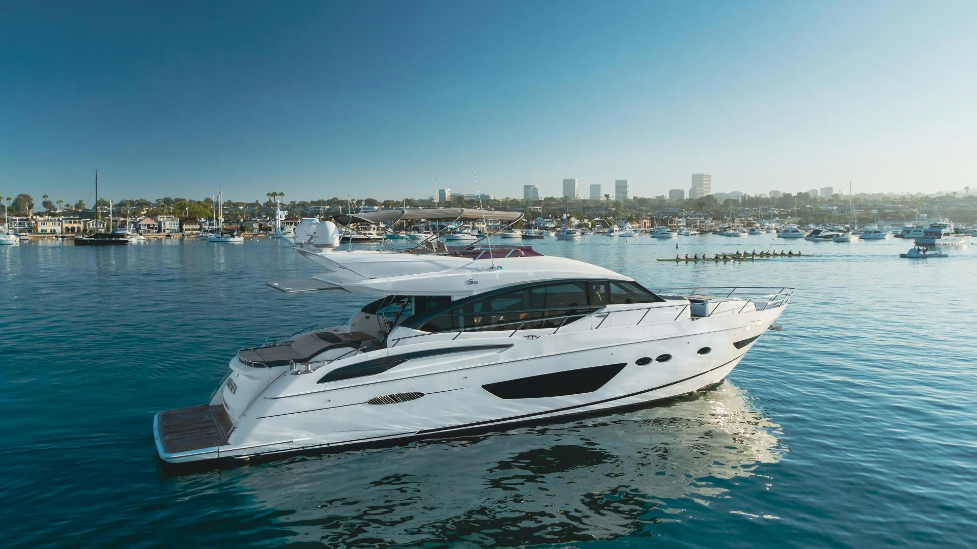 a white yacht in the water aboard SEXSEA Yacht for Sale