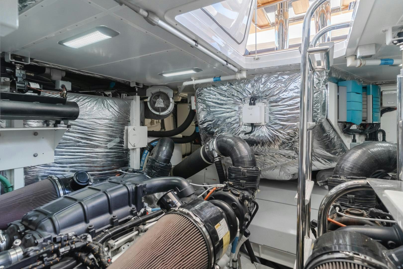 a large machine with a large metal object on the side aboard SEXSEA Yacht for Sale