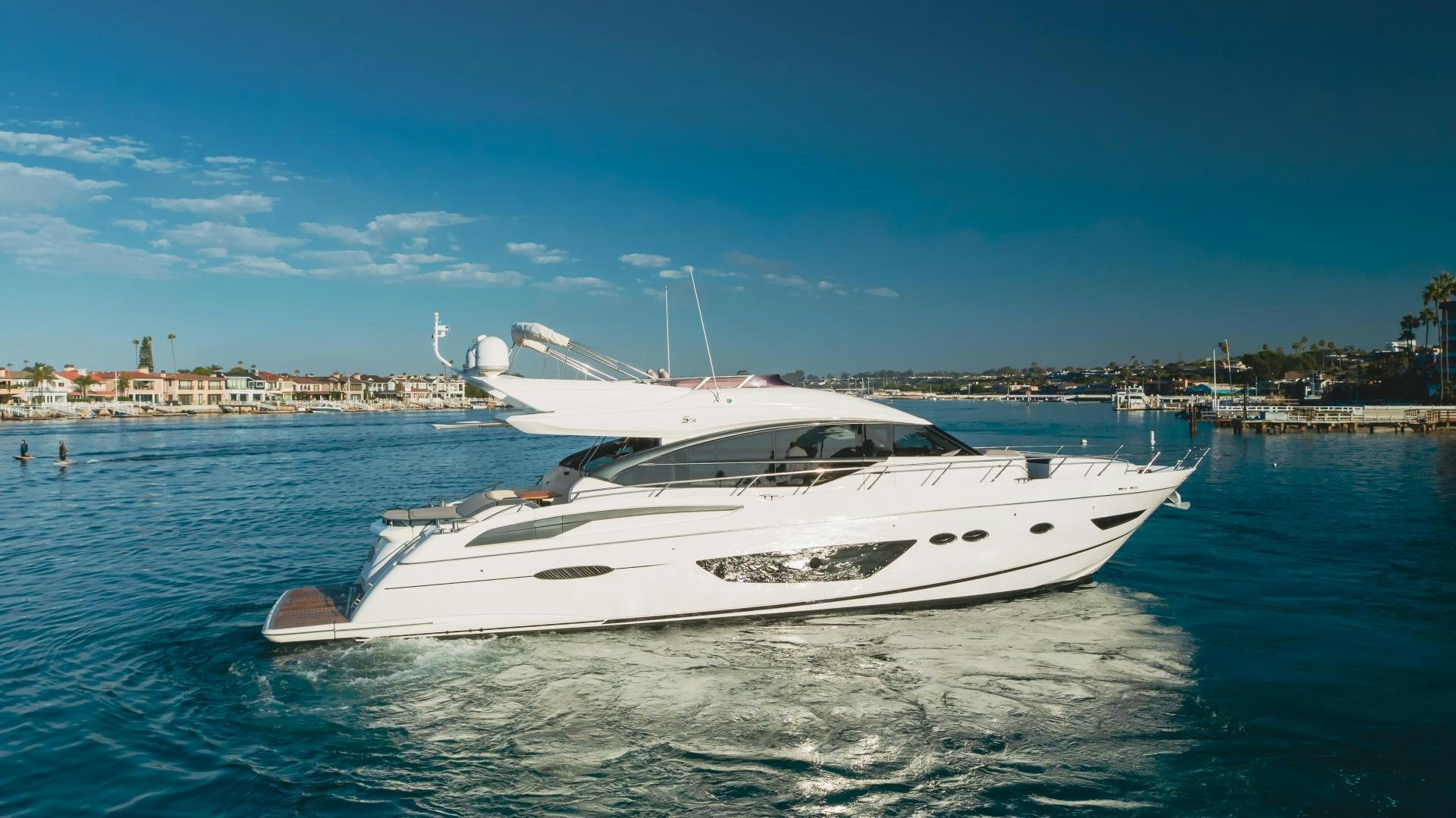a white boat on the water aboard SEXSEA Yacht for Sale