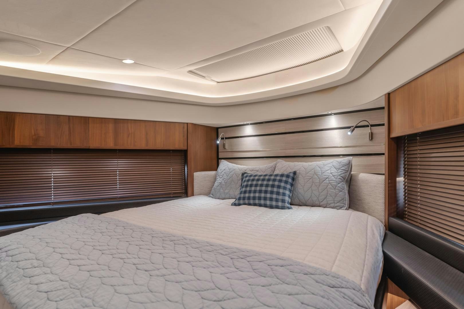 a bed in a room aboard SEXSEA Yacht for Sale