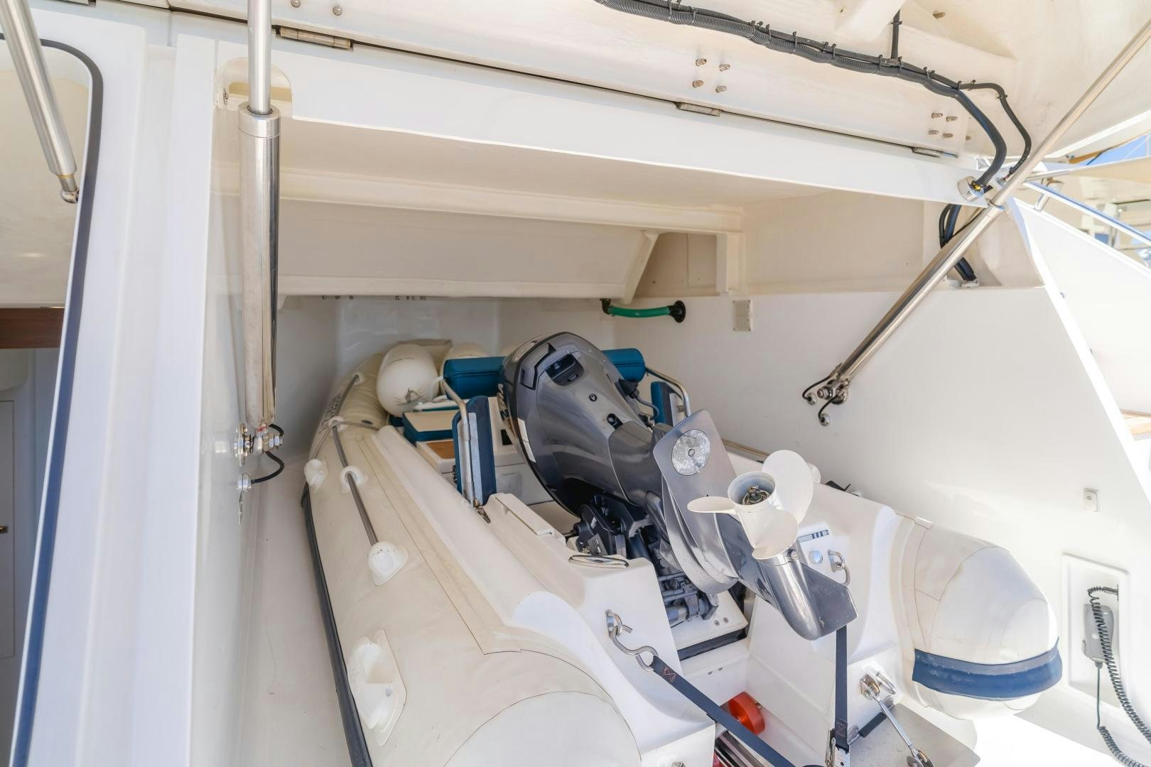 a white machine with a black helmet aboard SEXSEA Yacht for Sale