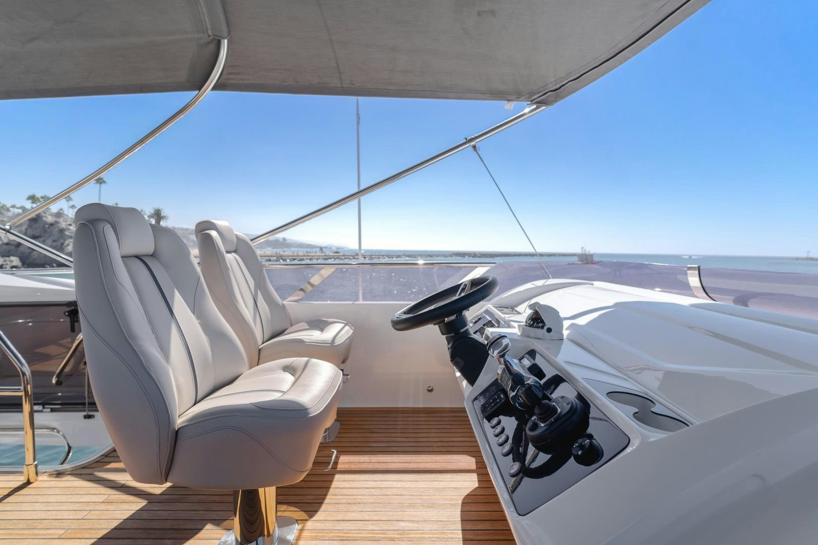 a chair on a deck aboard SEXSEA Yacht for Sale