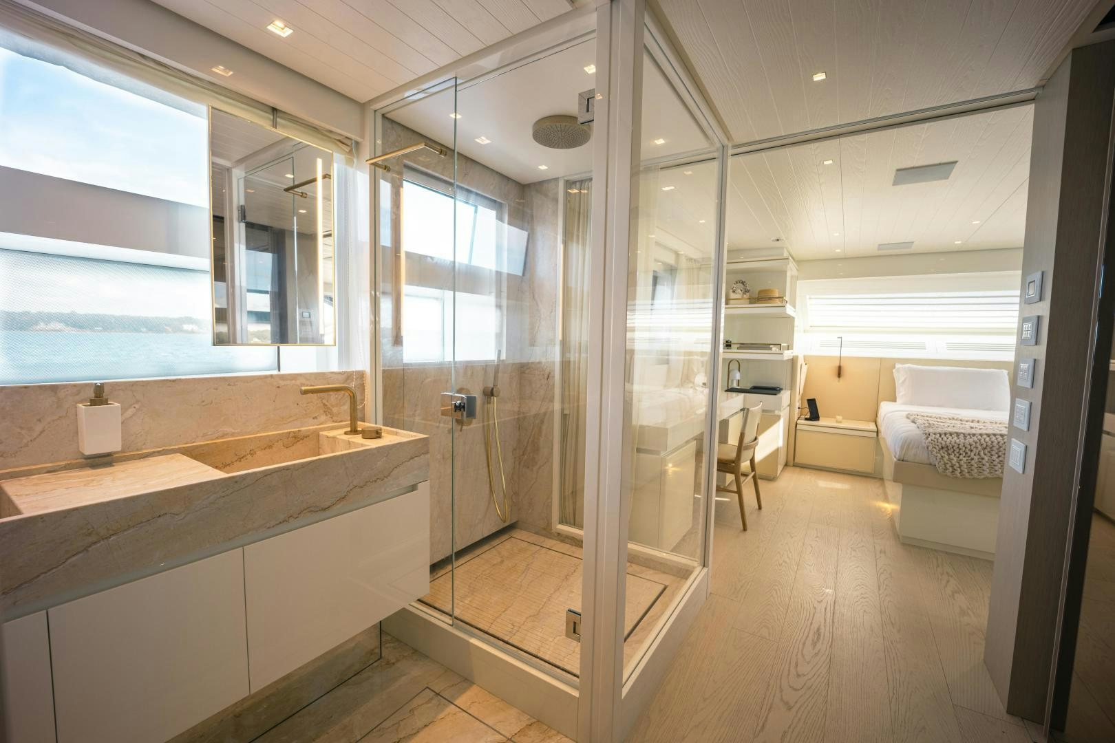 a bathroom with a glass shower aboard OUR ALEPH Yacht for Sale