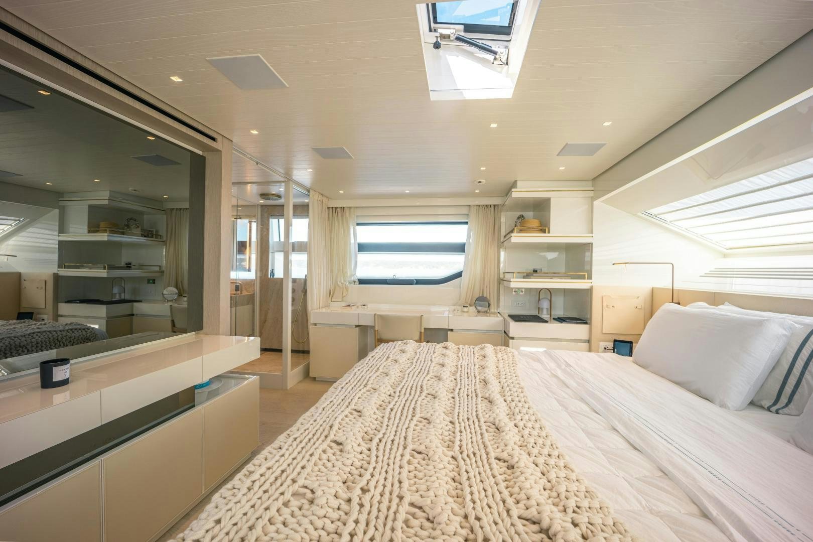 a large bedroom with a large bed aboard OUR ALEPH Yacht for Sale