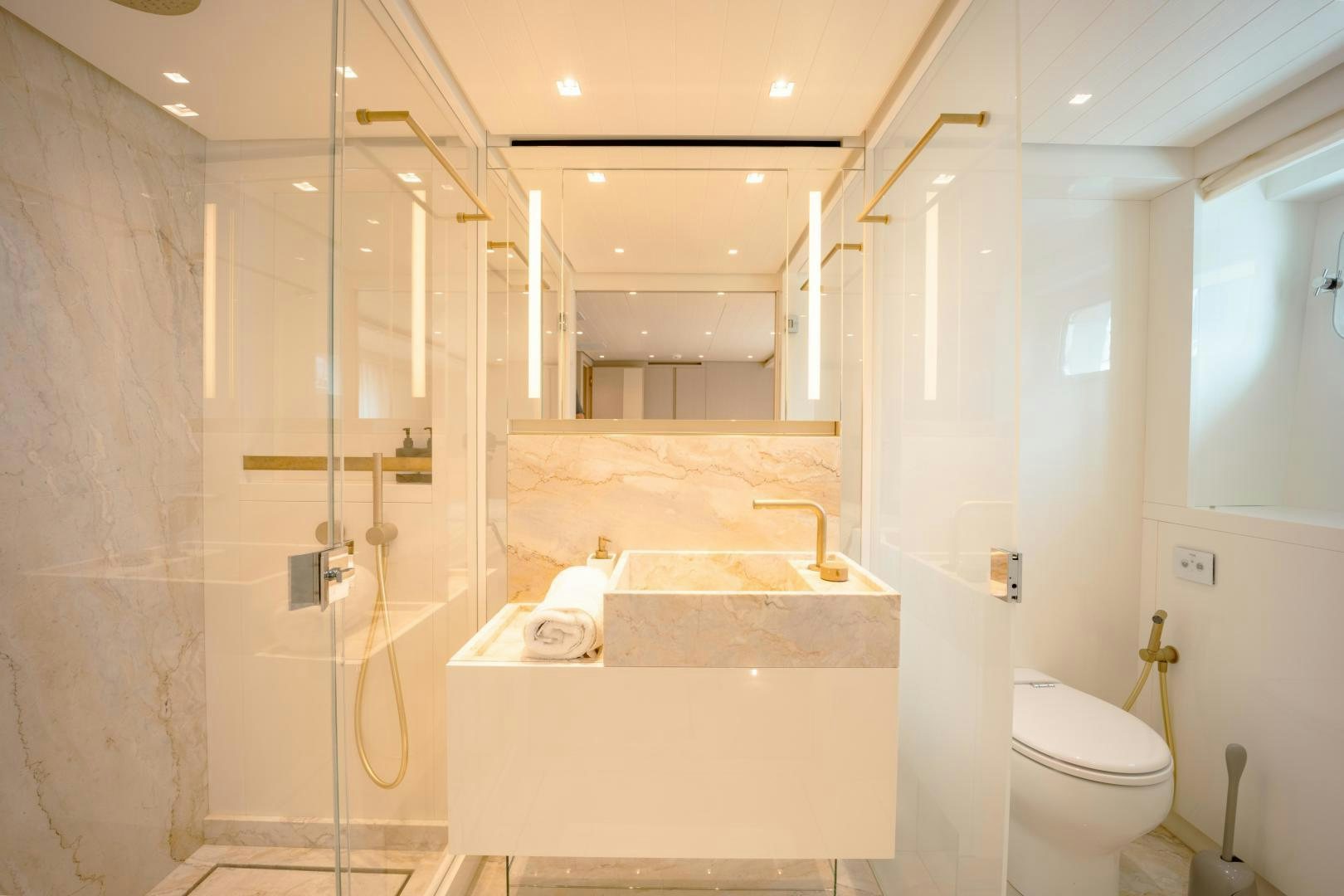 a bathroom with a tub sink and toilet aboard OUR ALEPH Yacht for Sale