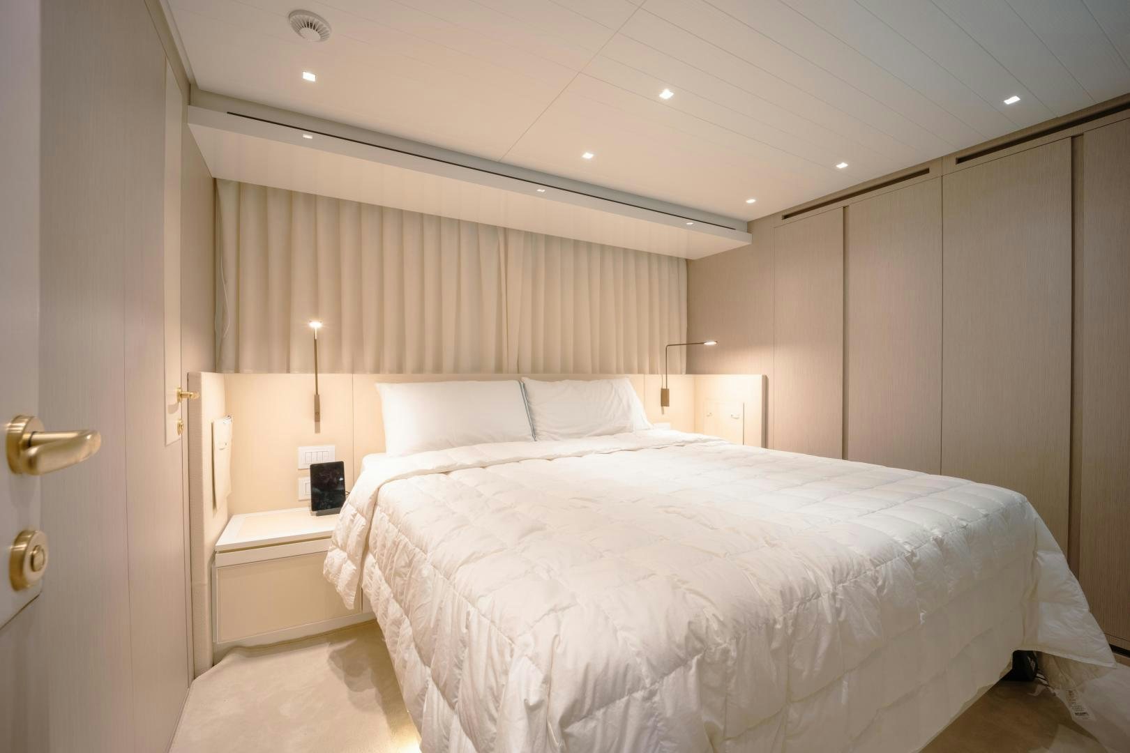 a bed in a room aboard OUR ALEPH Yacht for Sale