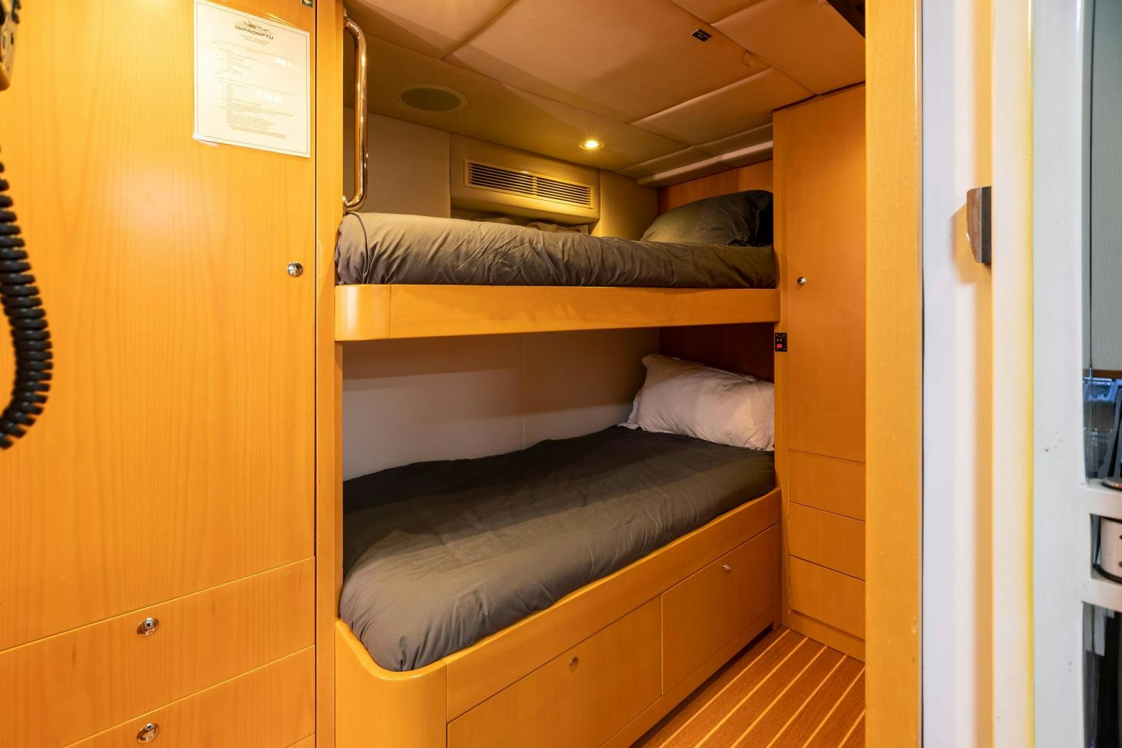 a room with bunk beds aboard IMPROMPTU Yacht for Sale