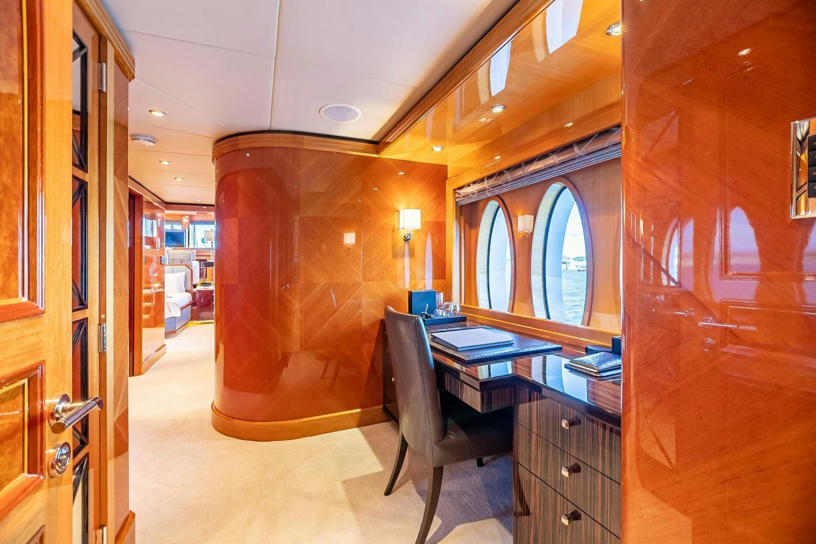 a room with a desk and a chair aboard IMPROMPTU Yacht for Sale
