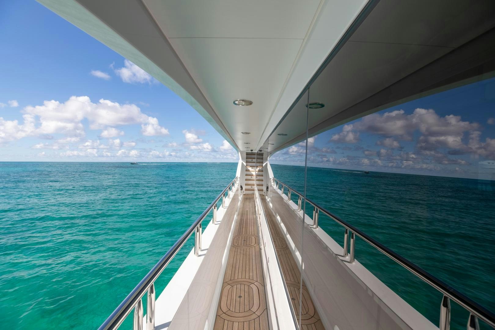 a long white bridge over water aboard IMPROMPTU Yacht for Sale
