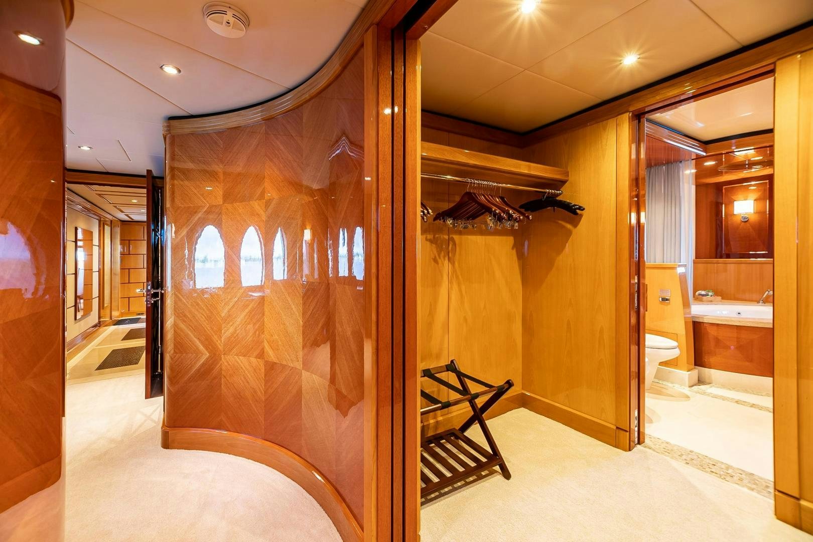 a bathroom with a shower and a sink aboard IMPROMPTU Yacht for Sale