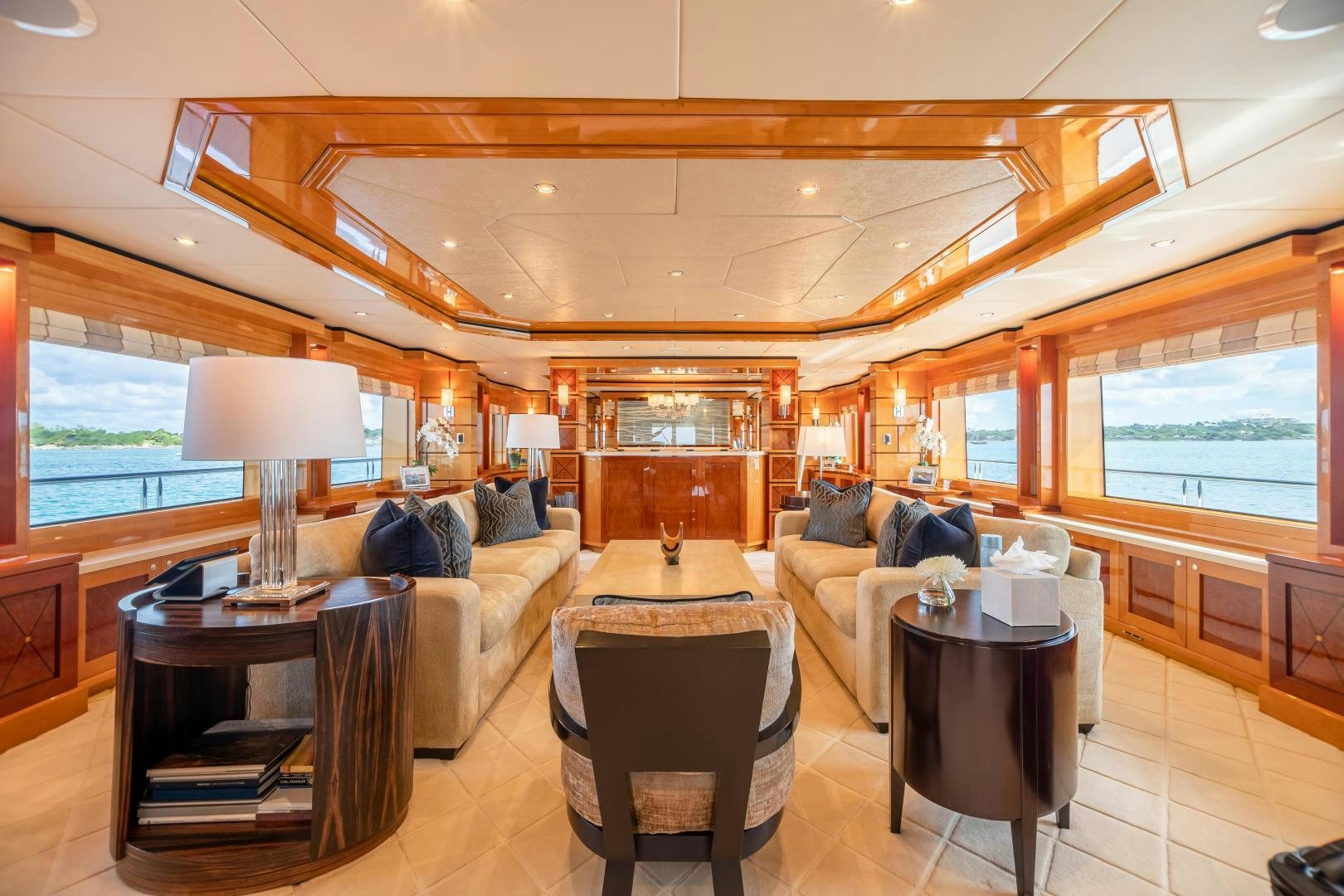 a living room with a couch and a table aboard IMPROMPTU Yacht for Sale