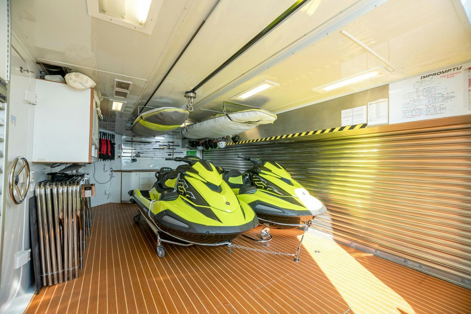 a room with a large green car aboard IMPROMPTU Yacht for Charter