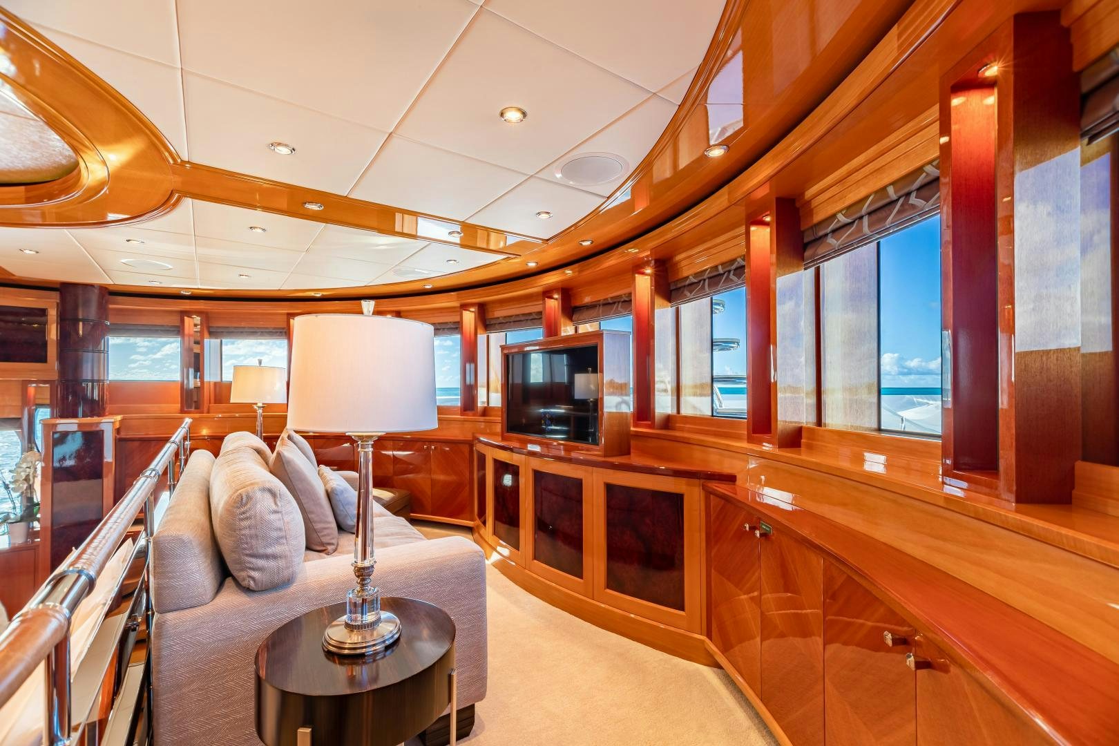 a room with a couch and a table aboard IMPROMPTU Yacht for Sale