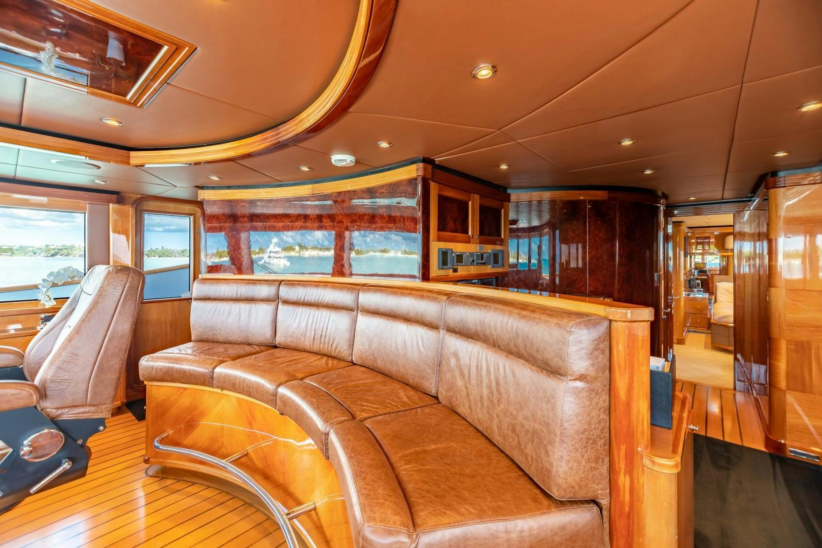 a living room with a wood floor aboard IMPROMPTU Yacht for Charter