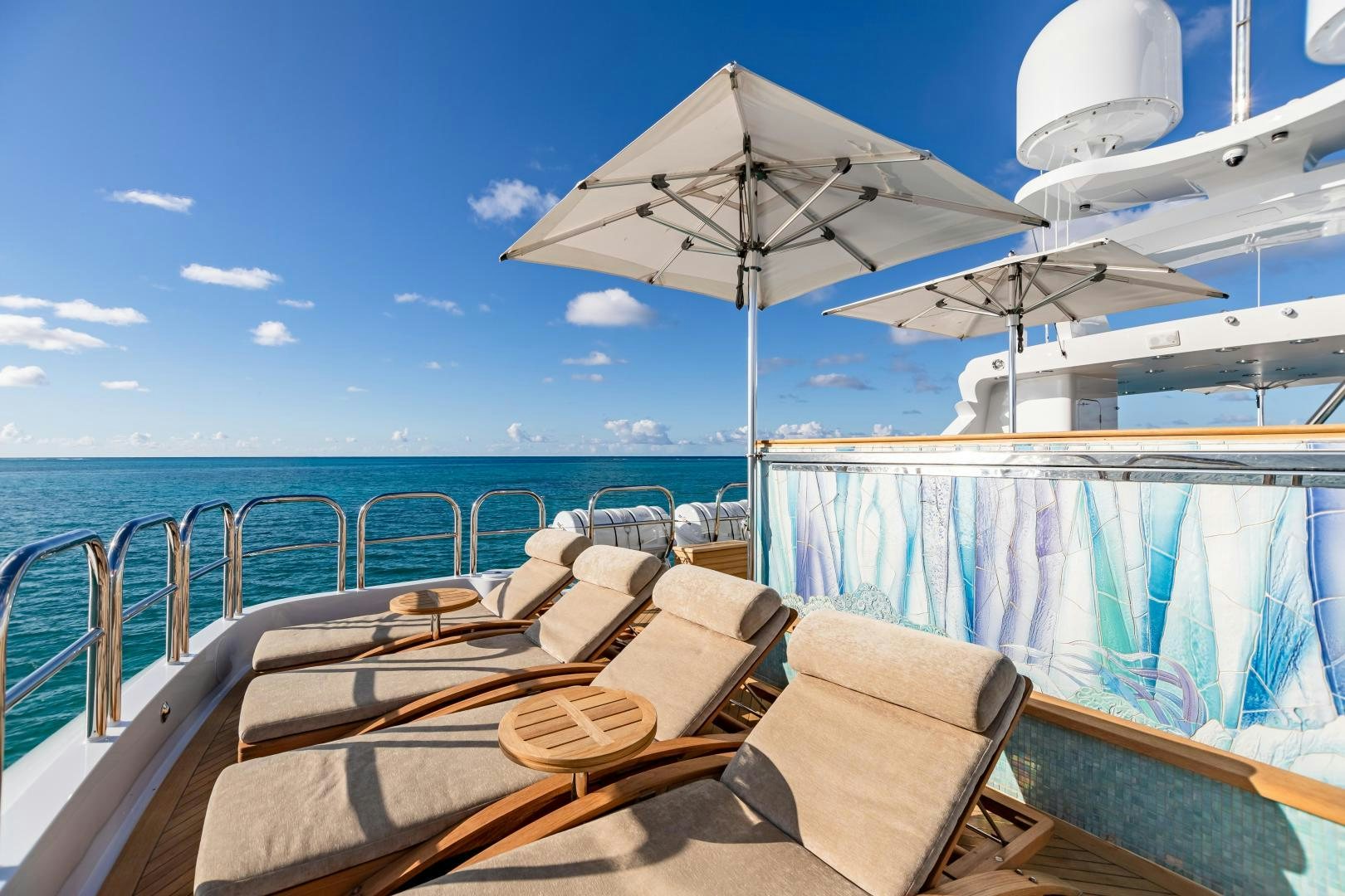 a boat with a white umbrella aboard IMPROMPTU Yacht for Charter