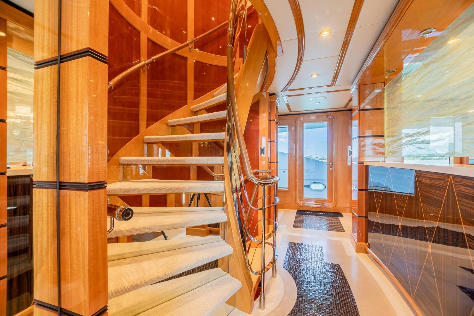 a wooden staircase in a building aboard IMPROMPTU Yacht for Charter