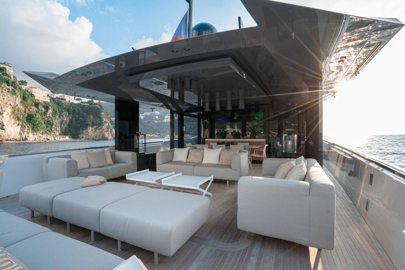 a large living room with a large balcony aboard MOTEK Yacht for Sale