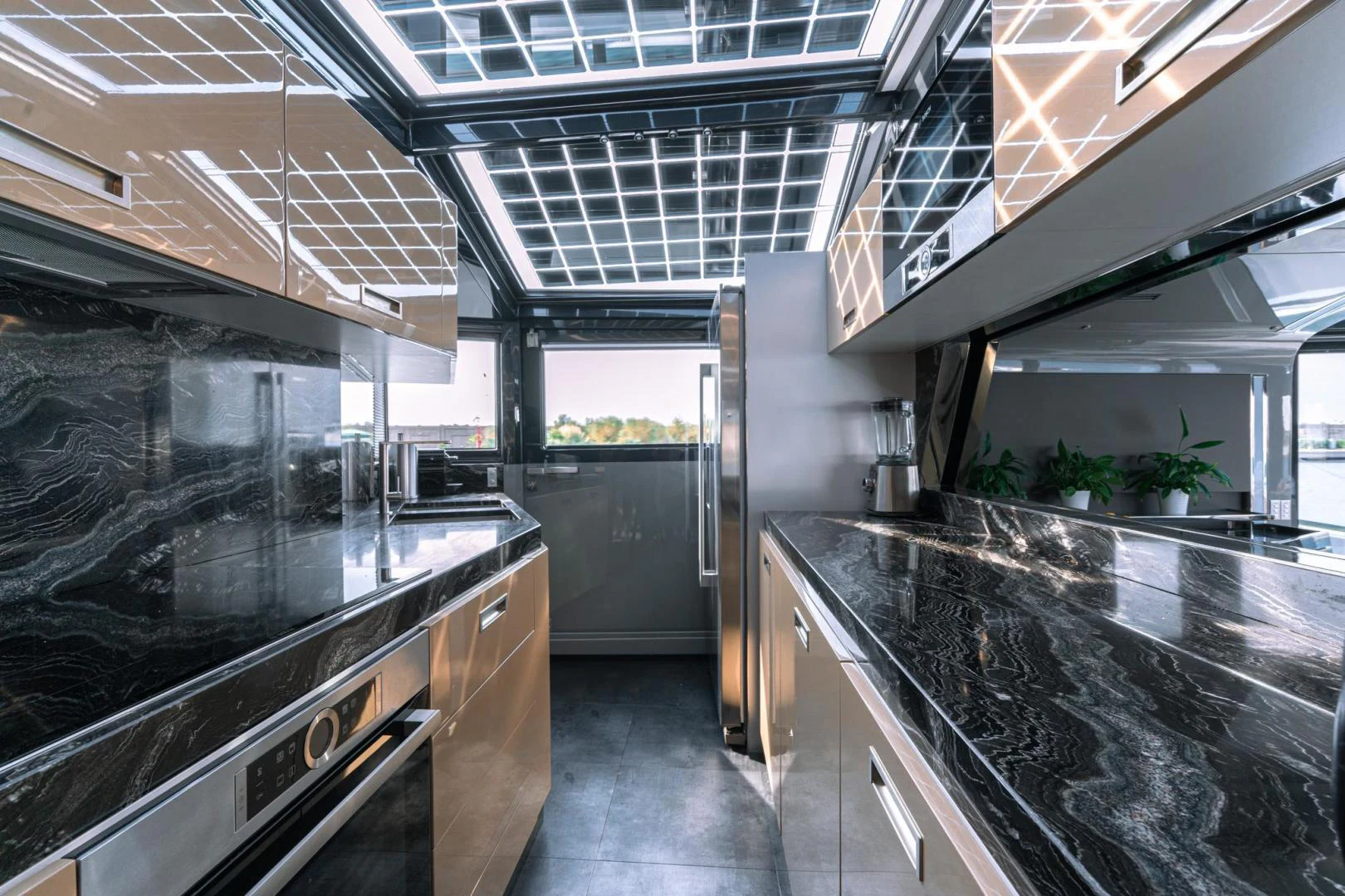 a kitchen with stainless steel appliances aboard MOTEK Yacht for Sale