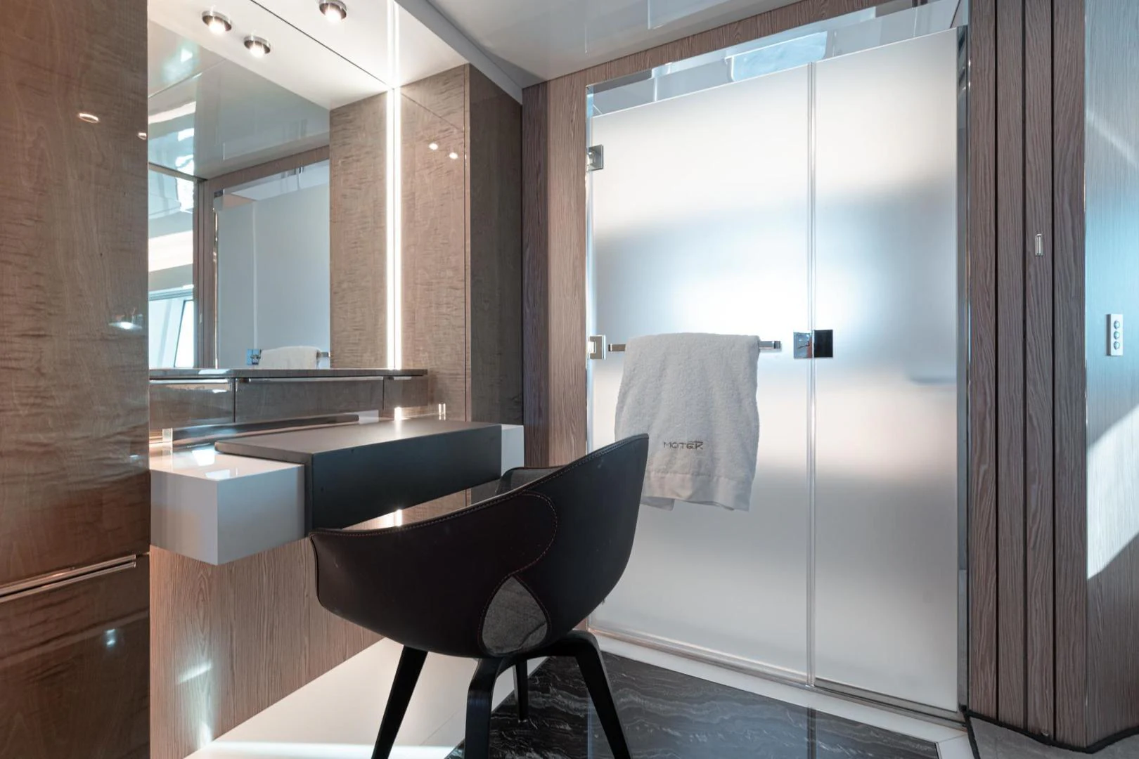 a chair in a bathroom aboard MOTEK Yacht for Sale