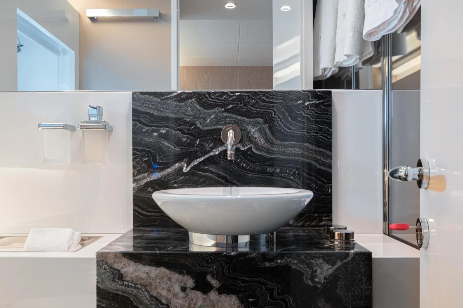 a bathroom with a marble counter top aboard MOTEK Yacht for Sale
