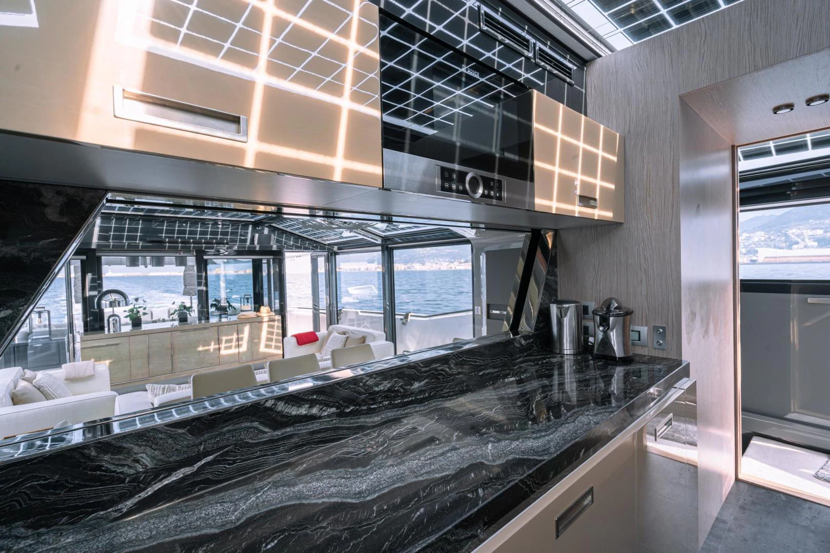 a kitchen with a large island aboard MOTEK Yacht for Sale