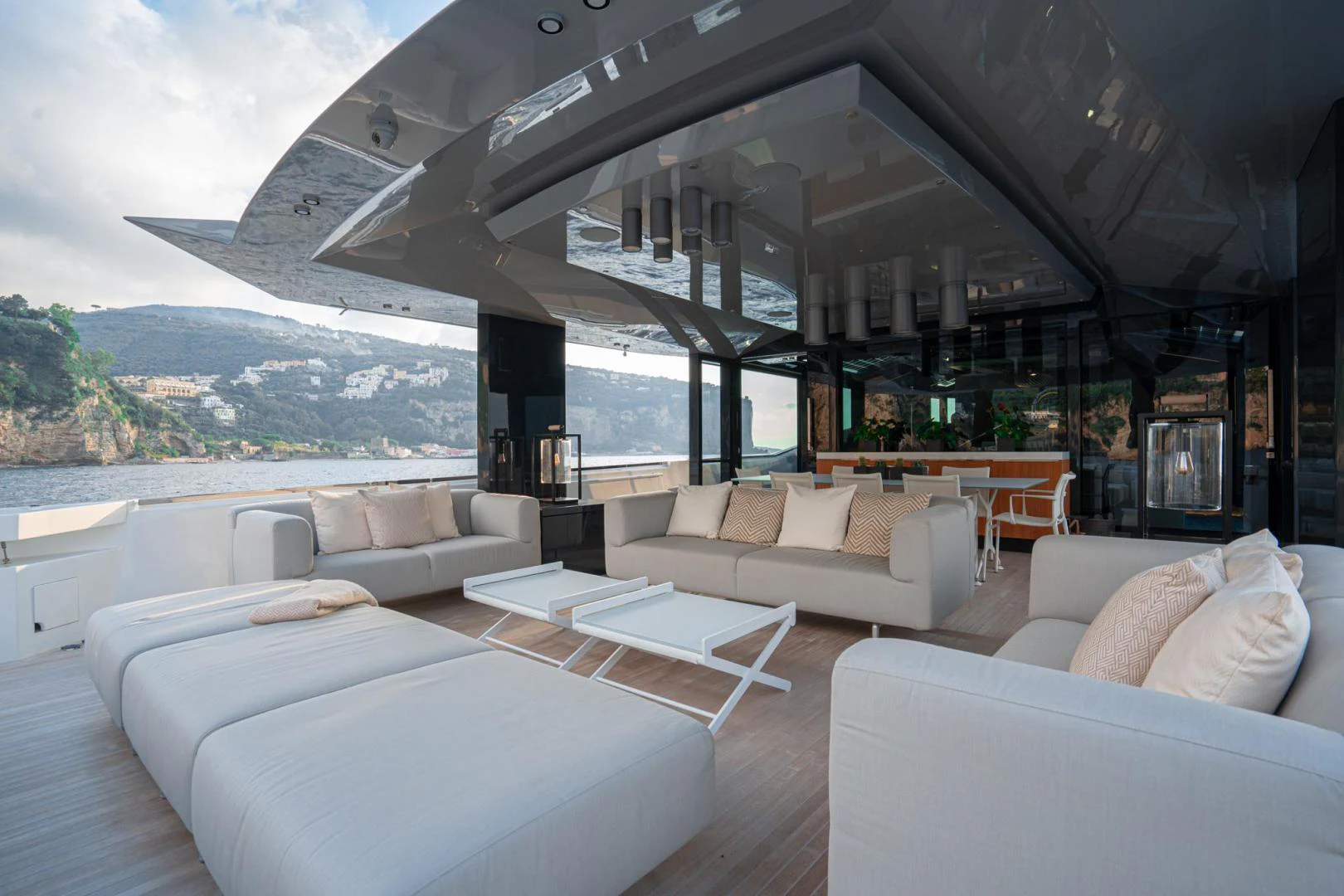 a living room with a large window aboard MOTEK Yacht for Sale