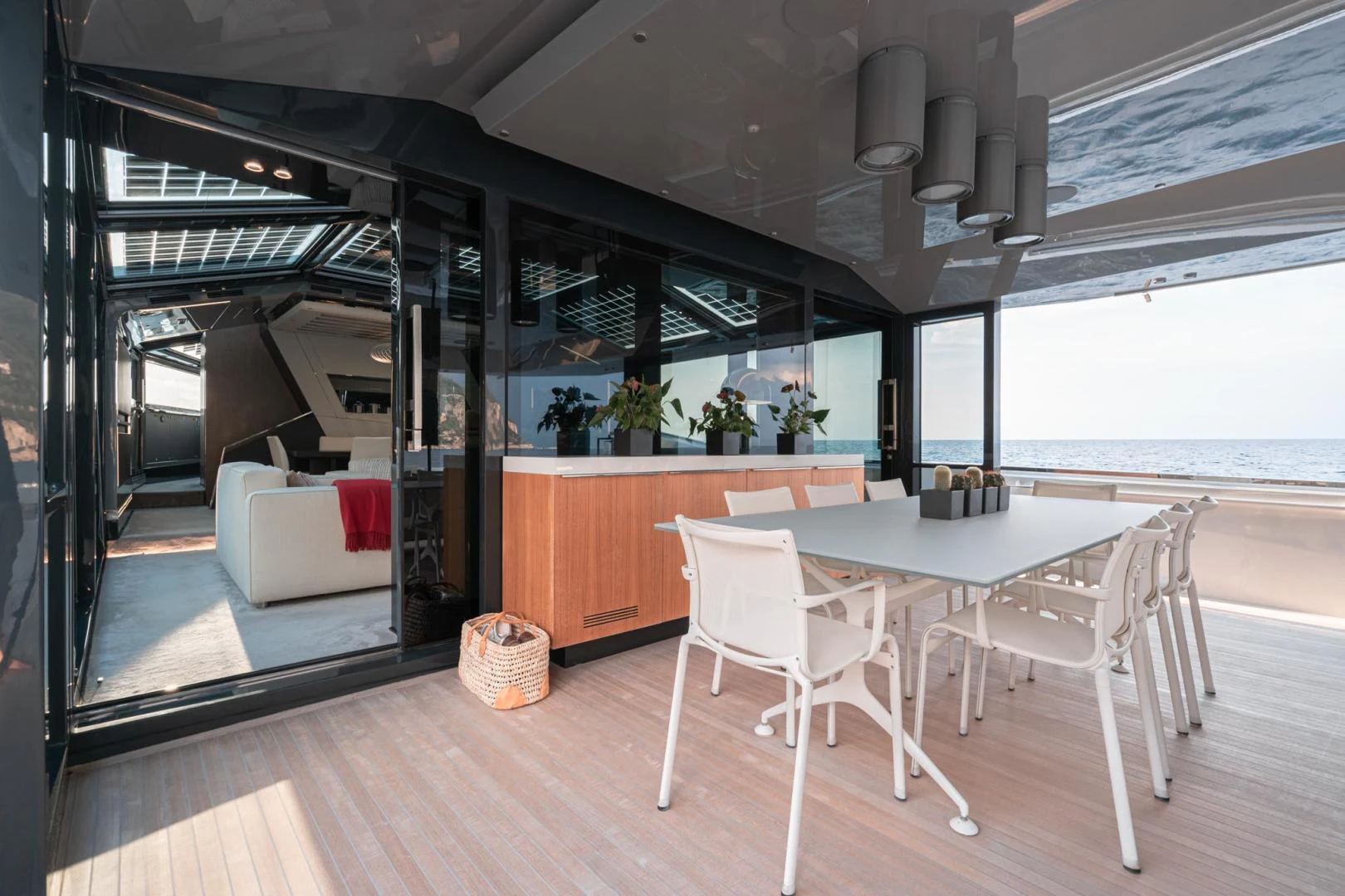 a room with a table chairs and a couch aboard MOTEK Yacht for Sale