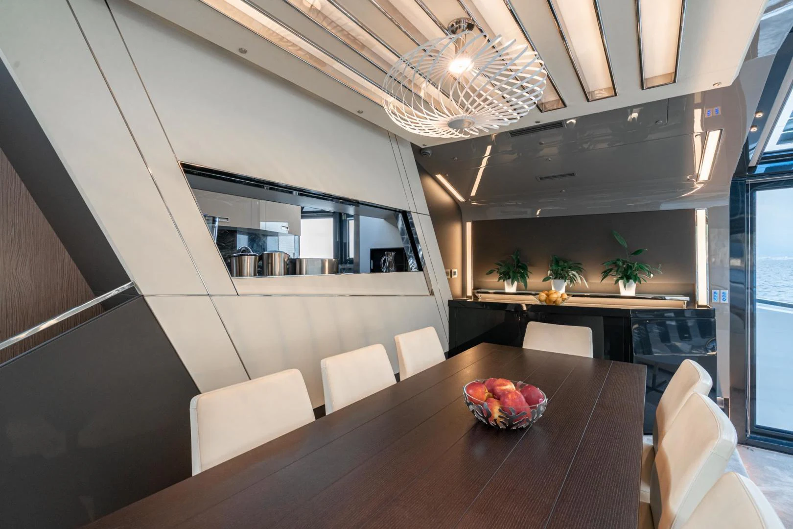 a modern kitchen with white walls aboard MOTEK Yacht for Sale