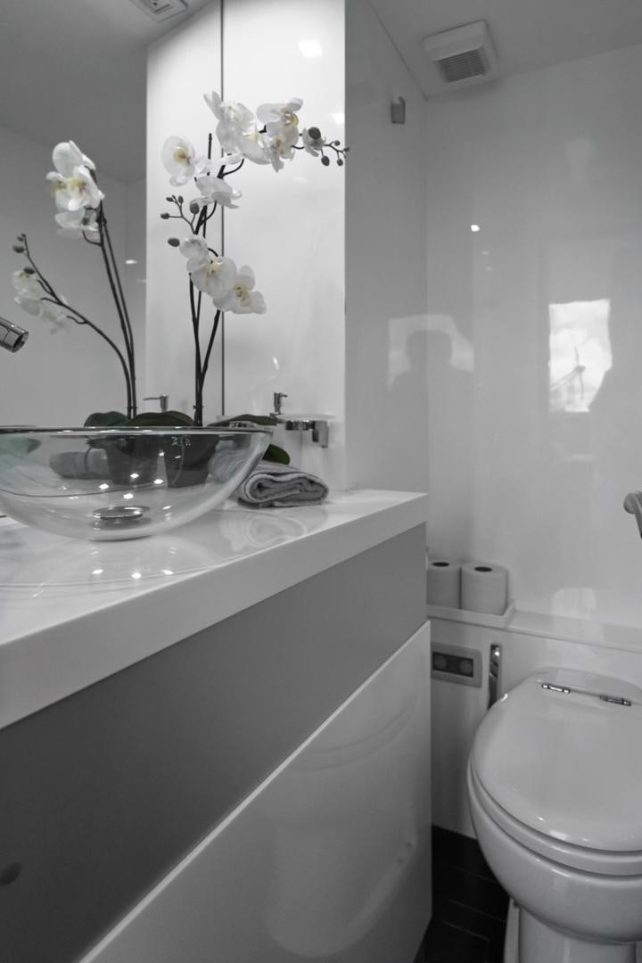 a bathroom with a sink and toilet aboard EL PATRON Yacht for Sale