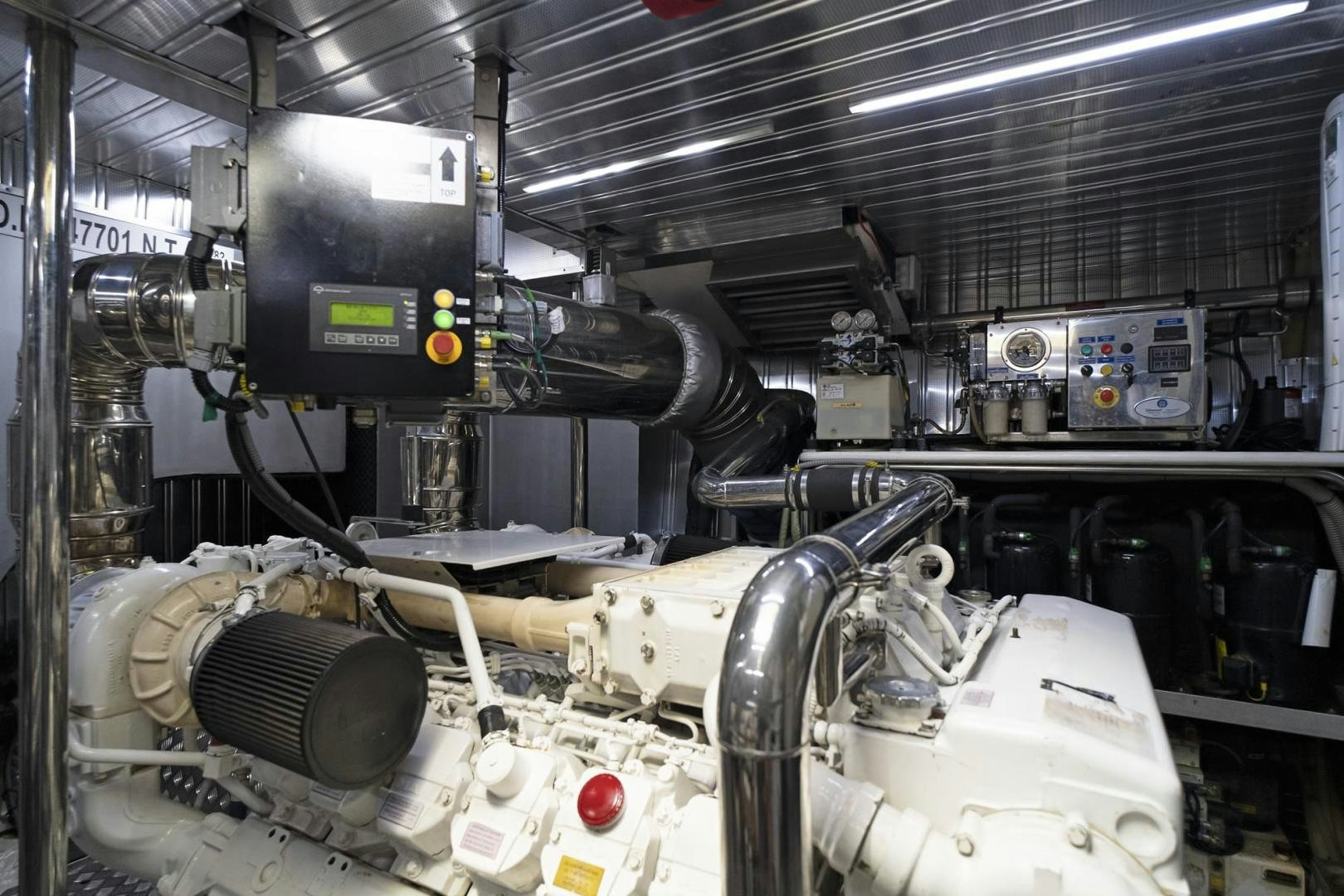 a large machine in a factory aboard EL PATRON Yacht for Sale