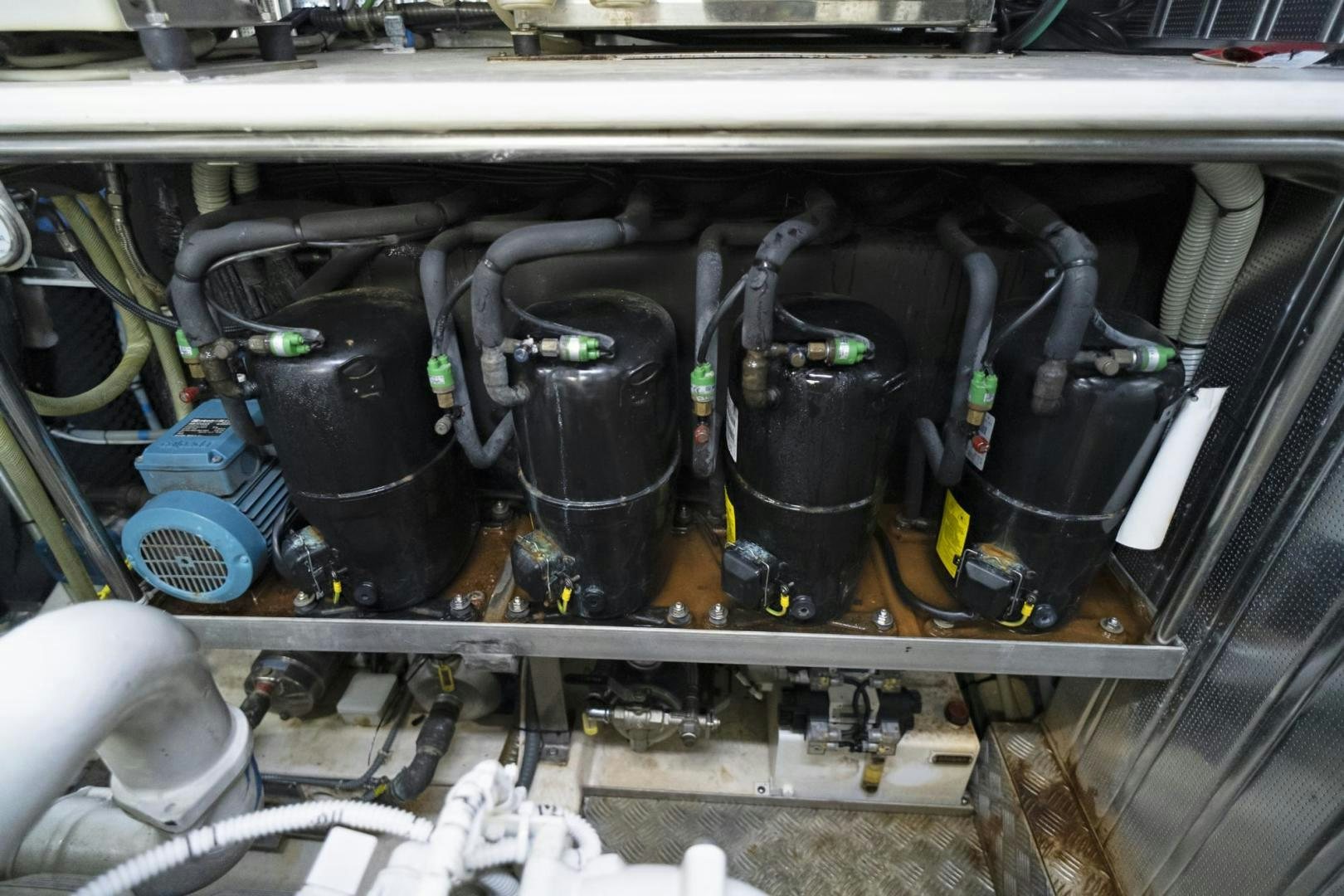 a car engine with a few parts aboard EL PATRON Yacht for Sale