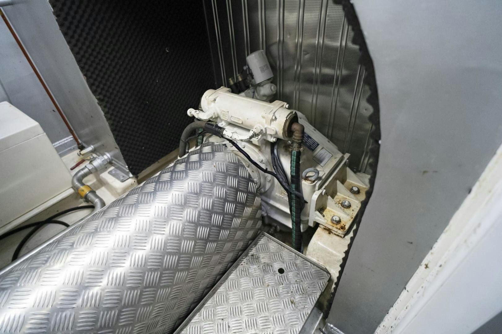 a machine with a large metal object aboard EL PATRON Yacht for Sale