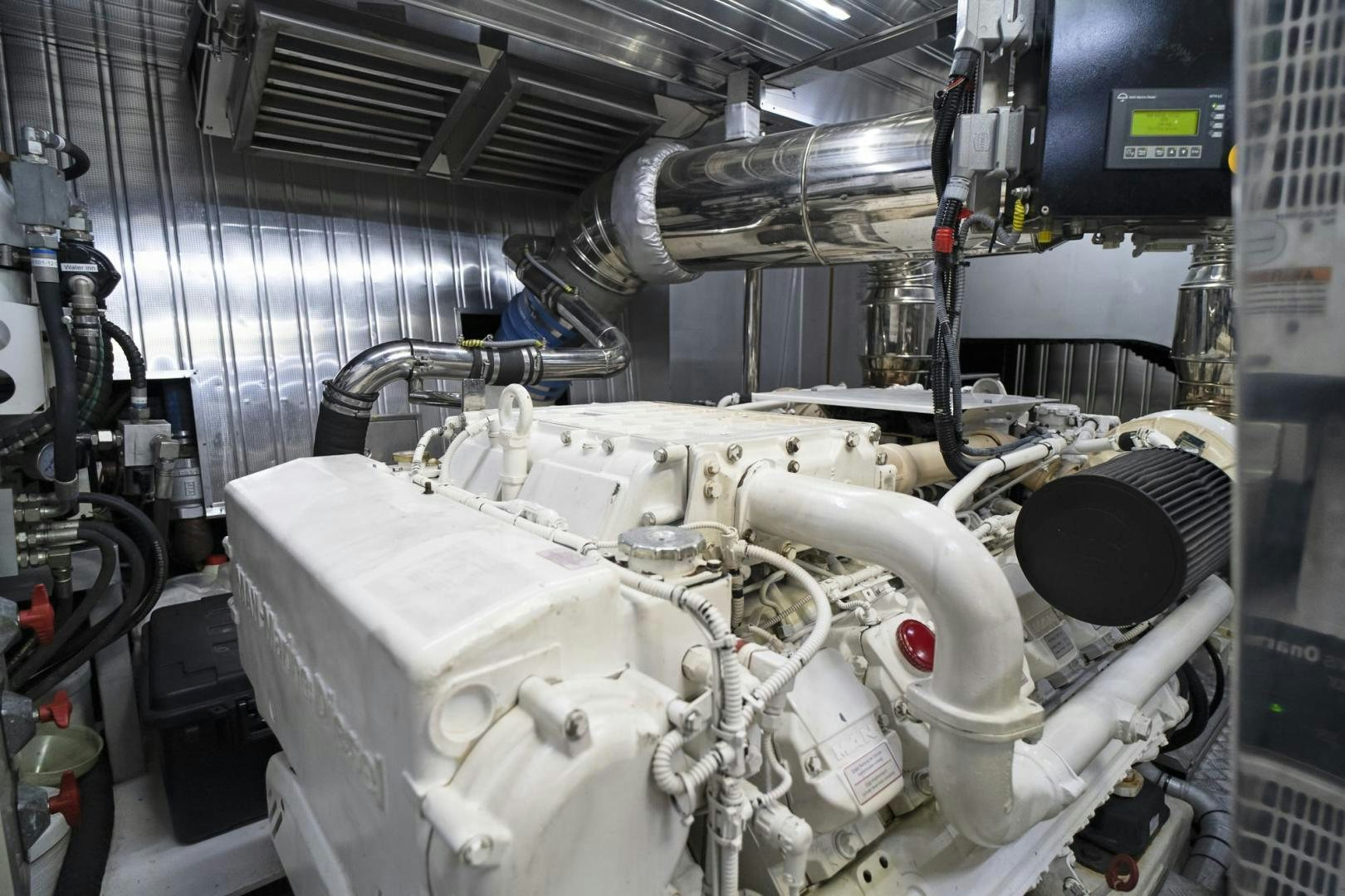 a large white machine in a room aboard EL PATRON Yacht for Sale