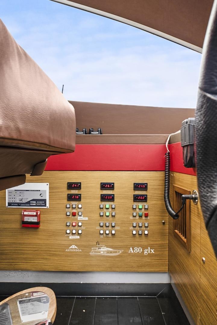 a person playing a guitar aboard EL PATRON Yacht for Sale