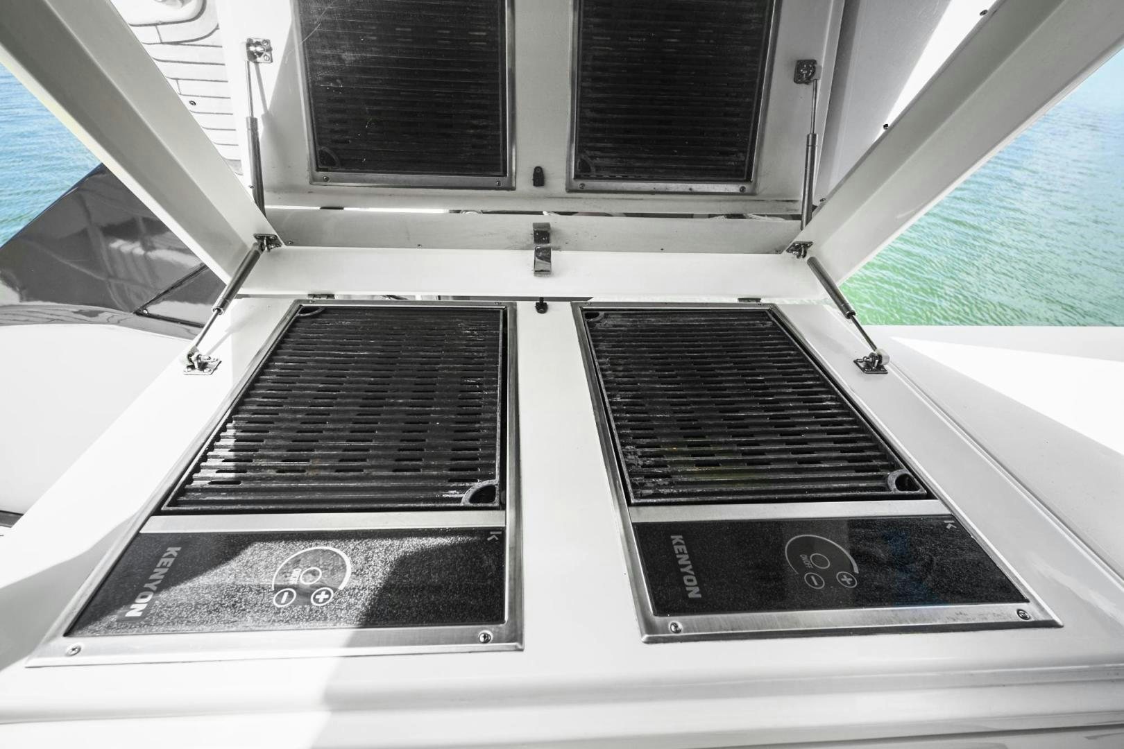 the back of a white boat aboard EL PATRON Yacht for Sale