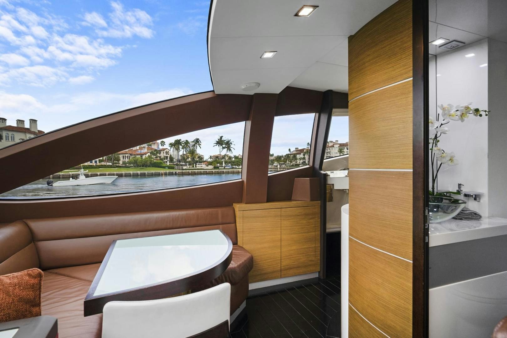 a room with a view of the backyard and the pool aboard EL PATRON Yacht for Sale