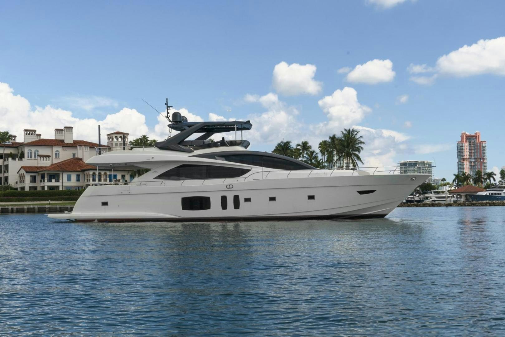 a white yacht in the water aboard EL PATRON Yacht for Sale