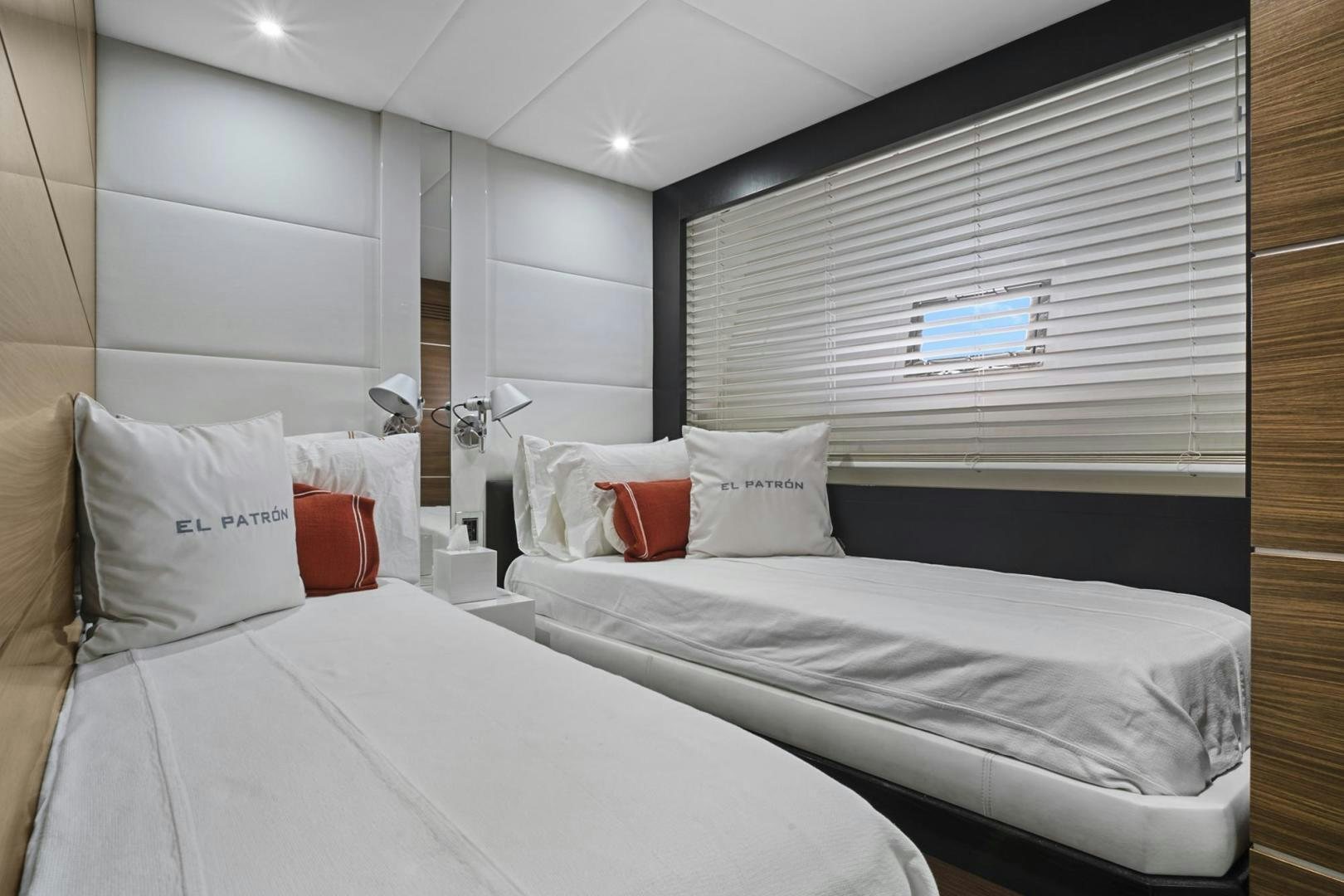 a room with two beds aboard EL PATRON Yacht for Sale