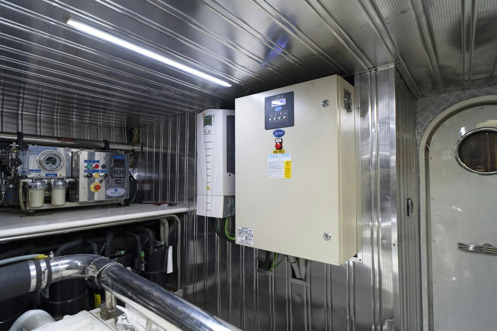 a machine in a room aboard EL PATRON Yacht for Sale