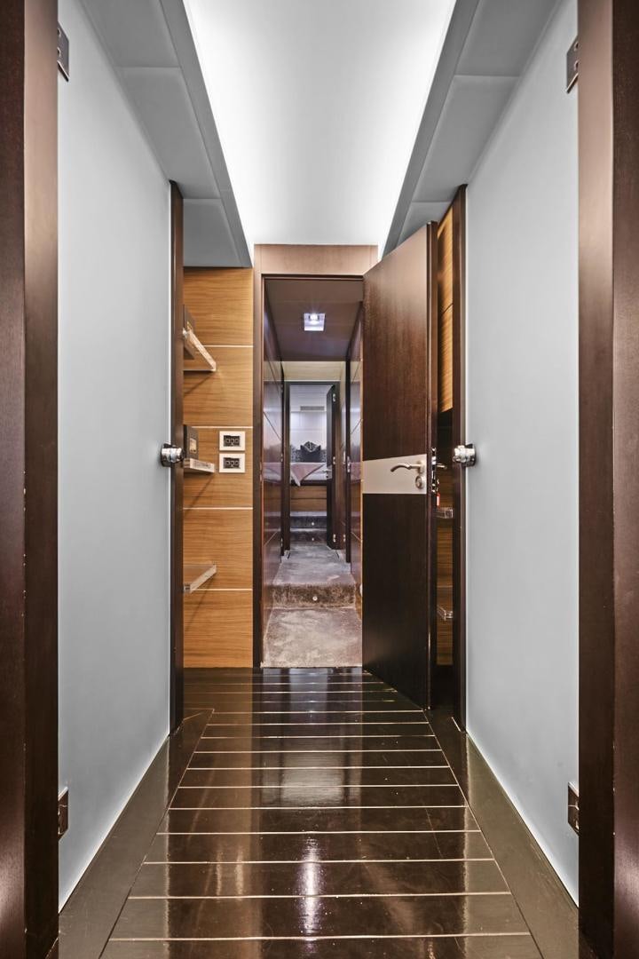 a hallway with doors aboard EL PATRON Yacht for Sale