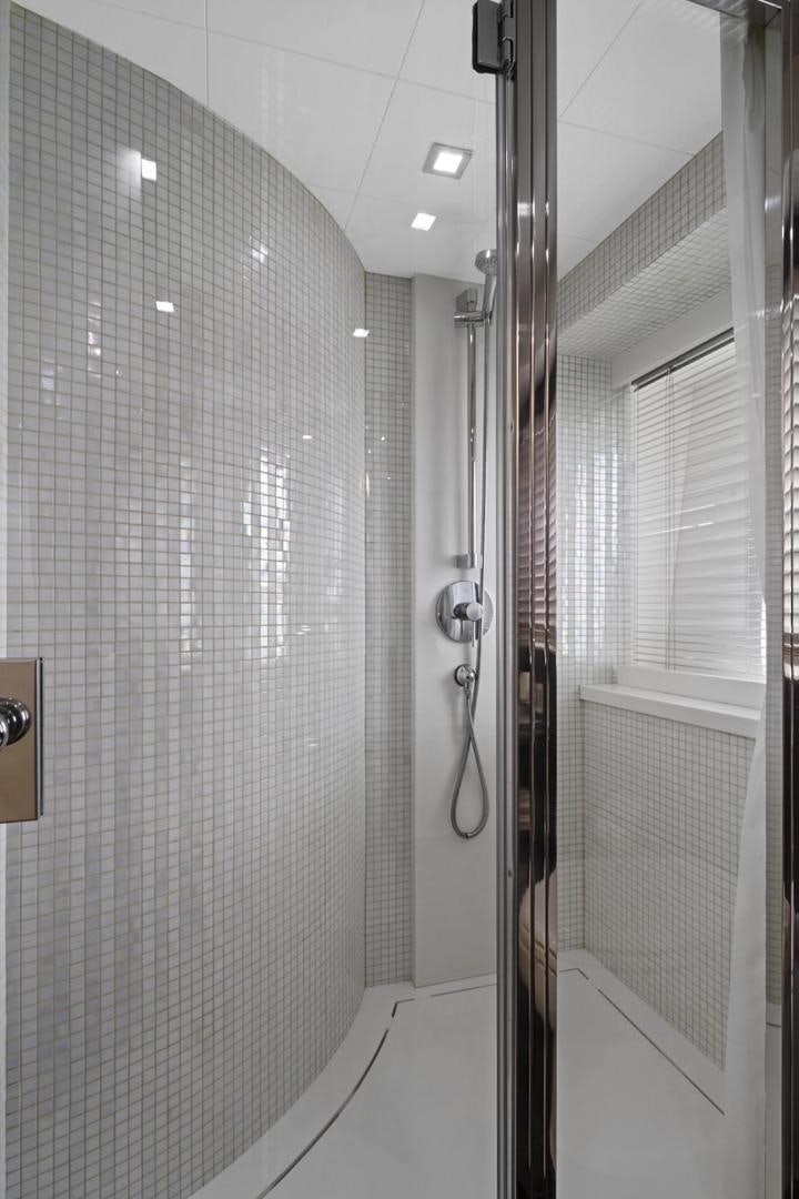 a shower unit in a bathroom aboard EL PATRON Yacht for Sale