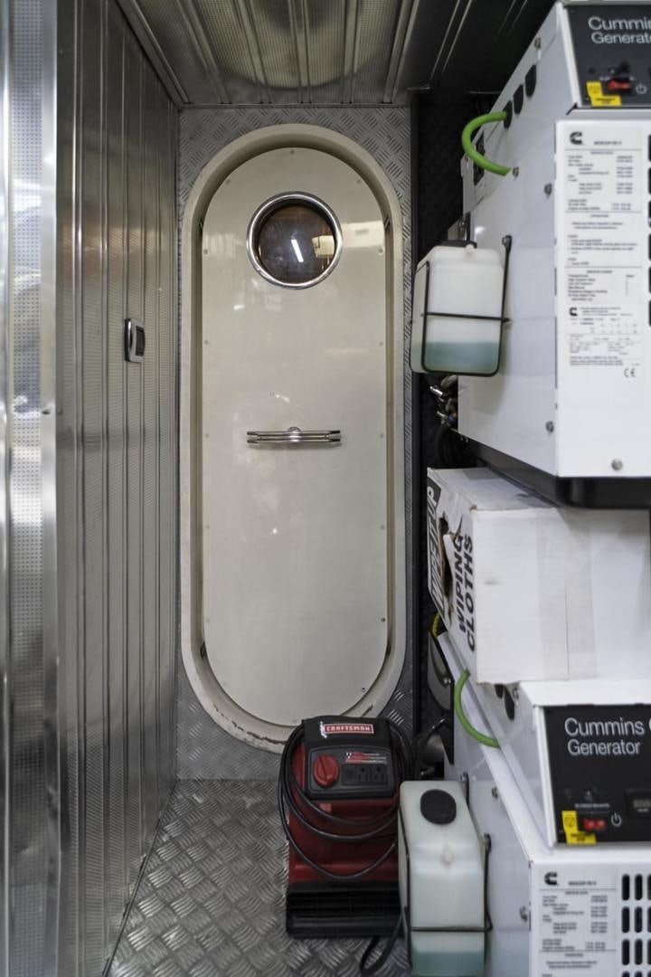 a machine in a room aboard EL PATRON Yacht for Sale