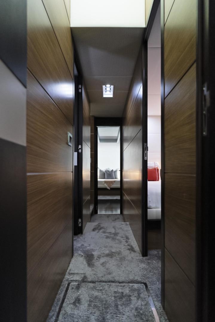 a hallway with doors aboard EL PATRON Yacht for Sale
